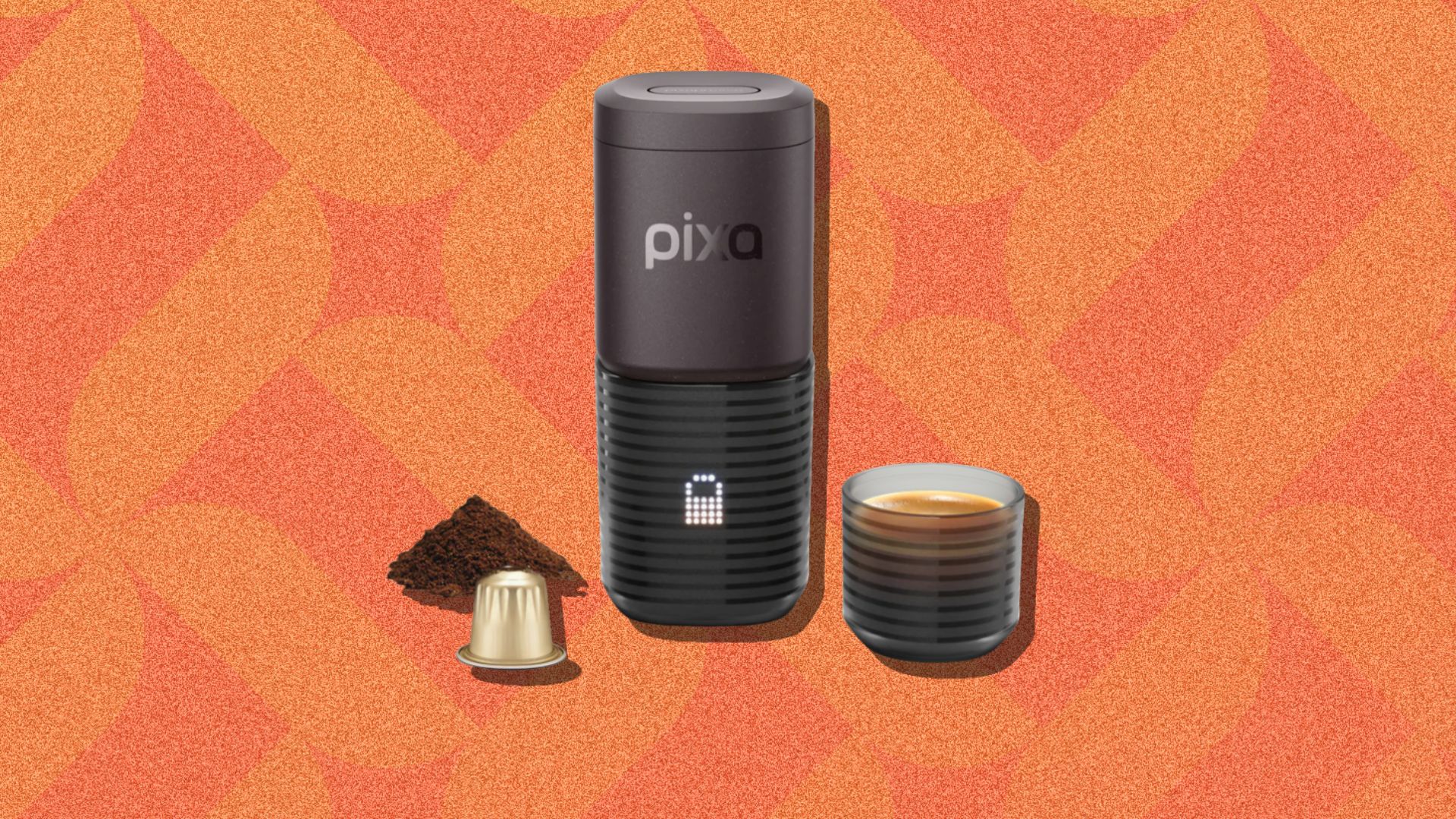 an image of the pixapresso machine next to some freshly brewed espresso against an orange patterned background