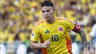 James Rodriguez celebrates scoring a goal for Colombia wearing his country's yellow football shirt at the 2026 World Cup qualifications.