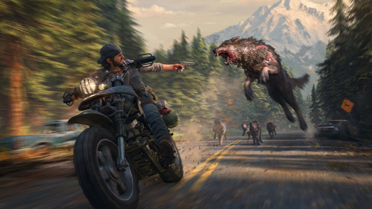 Days Gone protagonist riding a motorcycle while a wolf jumps at him