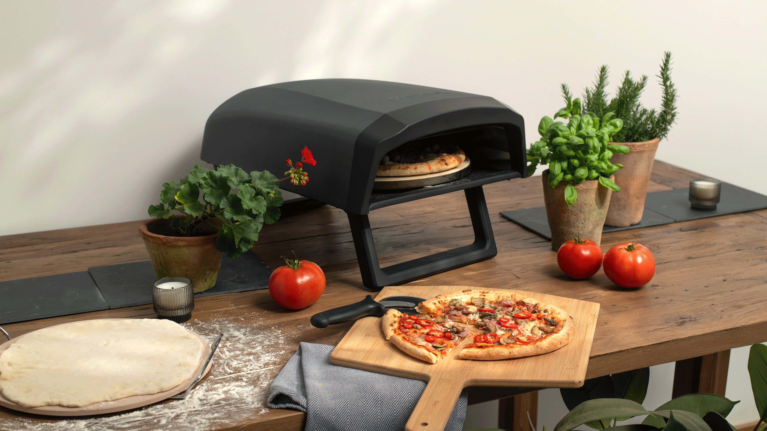 Pizza oven on wooden table
