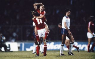 Denmark pair Klaus Berggreen (11) and Allan Simonsen celebrate a goal against England in Euro 1984 qualifying in September 1983.