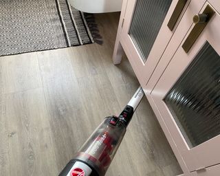 Image of Hoover H Free during testing under countertop