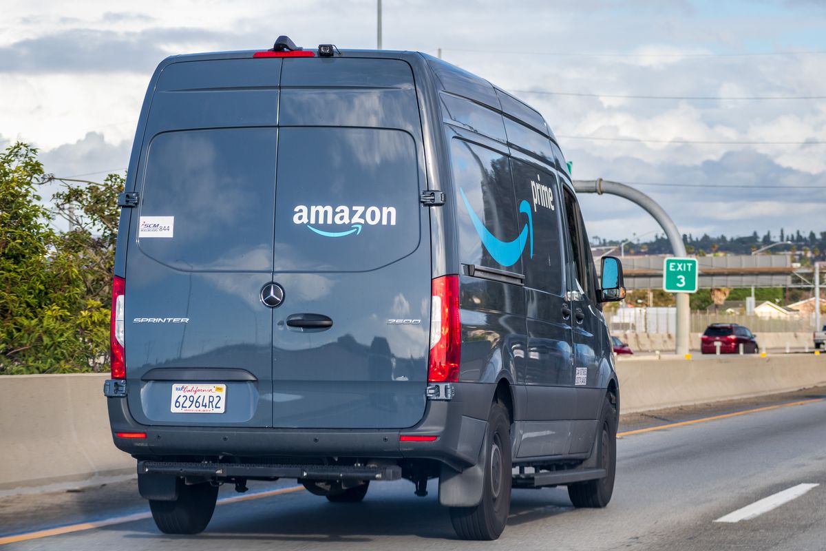 Amazon van driving down the highway