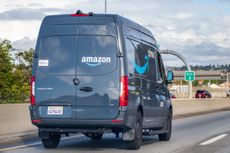 Amazon van driving down the highway