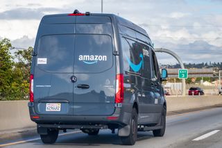 Amazon van driving down the highway