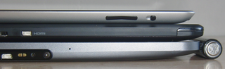 Thickness: iPad 2 (top), Xoom FE (middle), Xoom (bottom), AA battery (right)