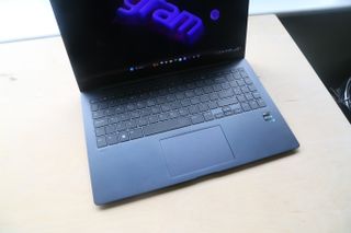 An LG gram SuperSlim 15.6" laptop sitting on a light desk