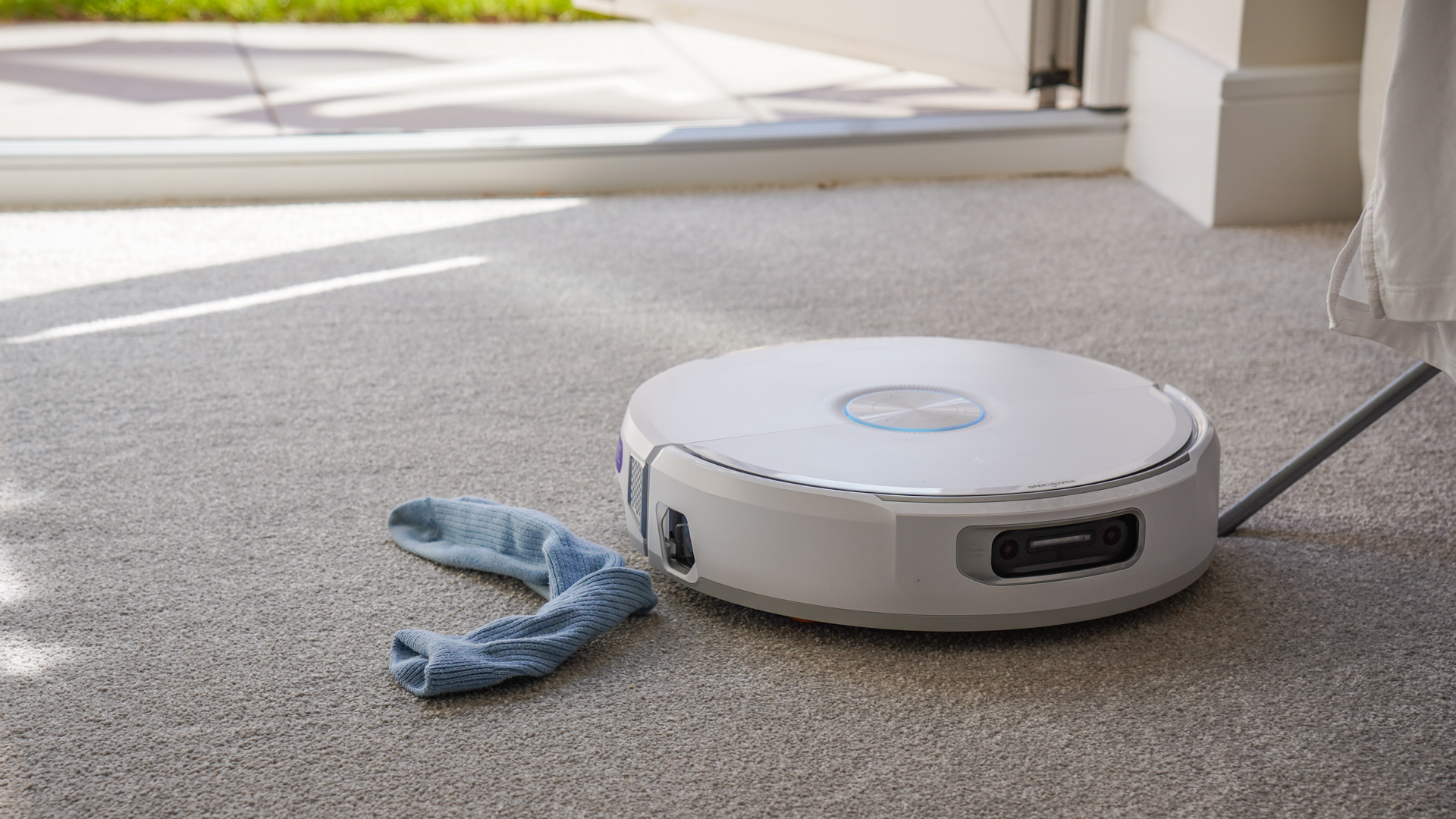 Narwal Flow robot vacuum avoiding a sock