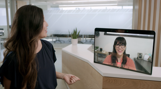 Zoom's virtual receptionist greeting a visitor