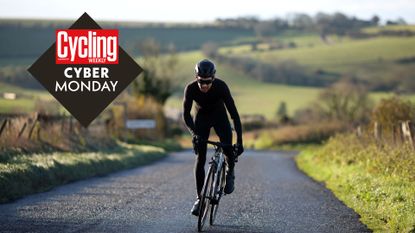 Cyber Monday image of a rider on a bike in black kit
