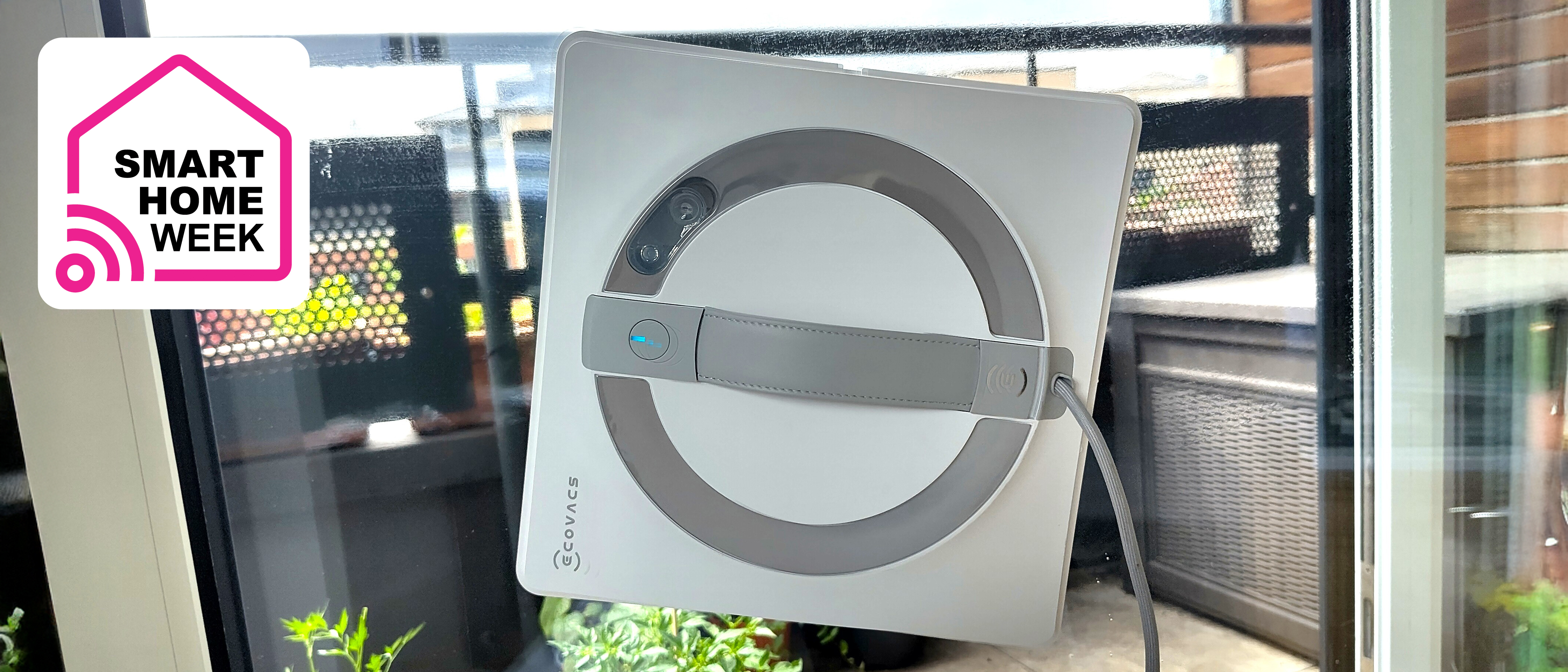Ecovacs Winbot W2 Pro Omni on window
