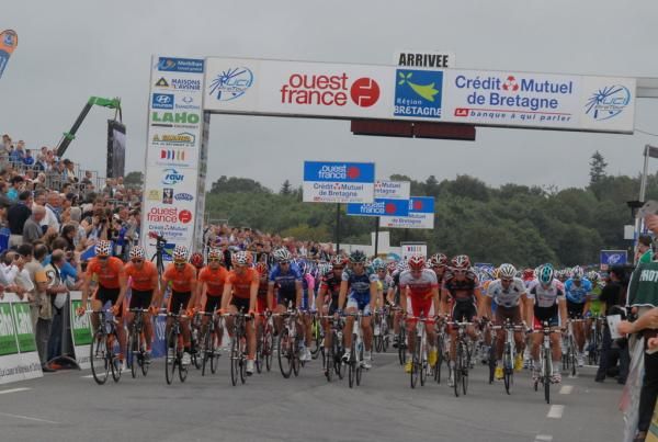 The bunch rolls out at the start of the race