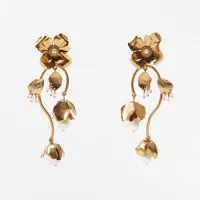 Flower earrings with pearls, $22.33 (£17.99) | Zara