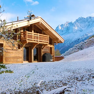 wooden ski lodge in snow mountain