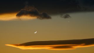 Crescent moon, Venus (planet) and lenticular clouds
