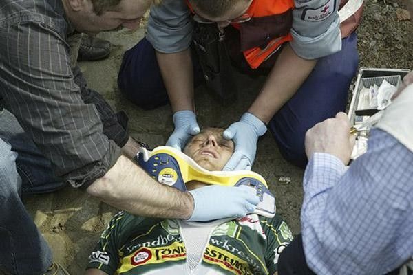 James Vanlandschoot gets a neck brace after crashing