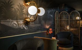Hotel Snob Paris room with velvet sofa chair