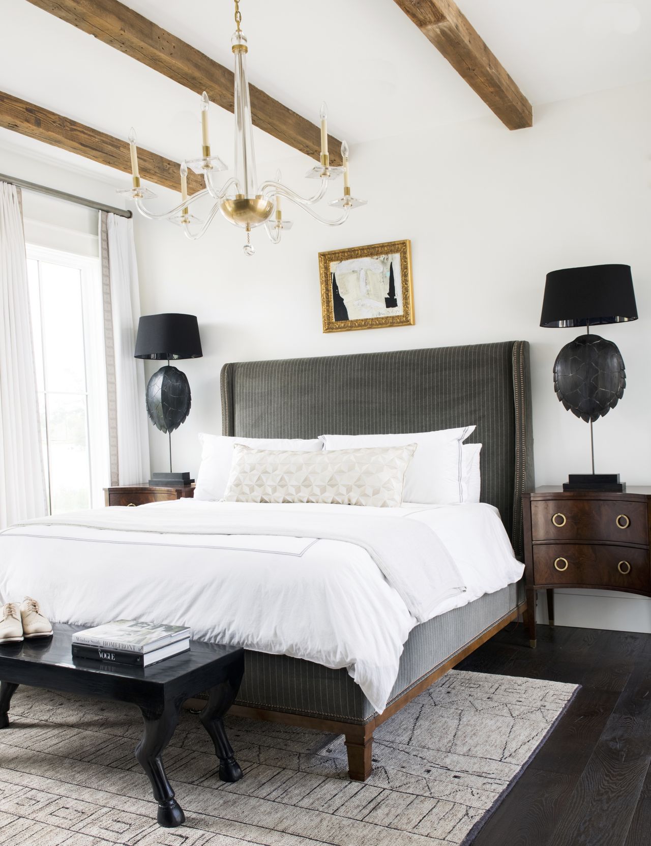 A brown bedroom with a painted table