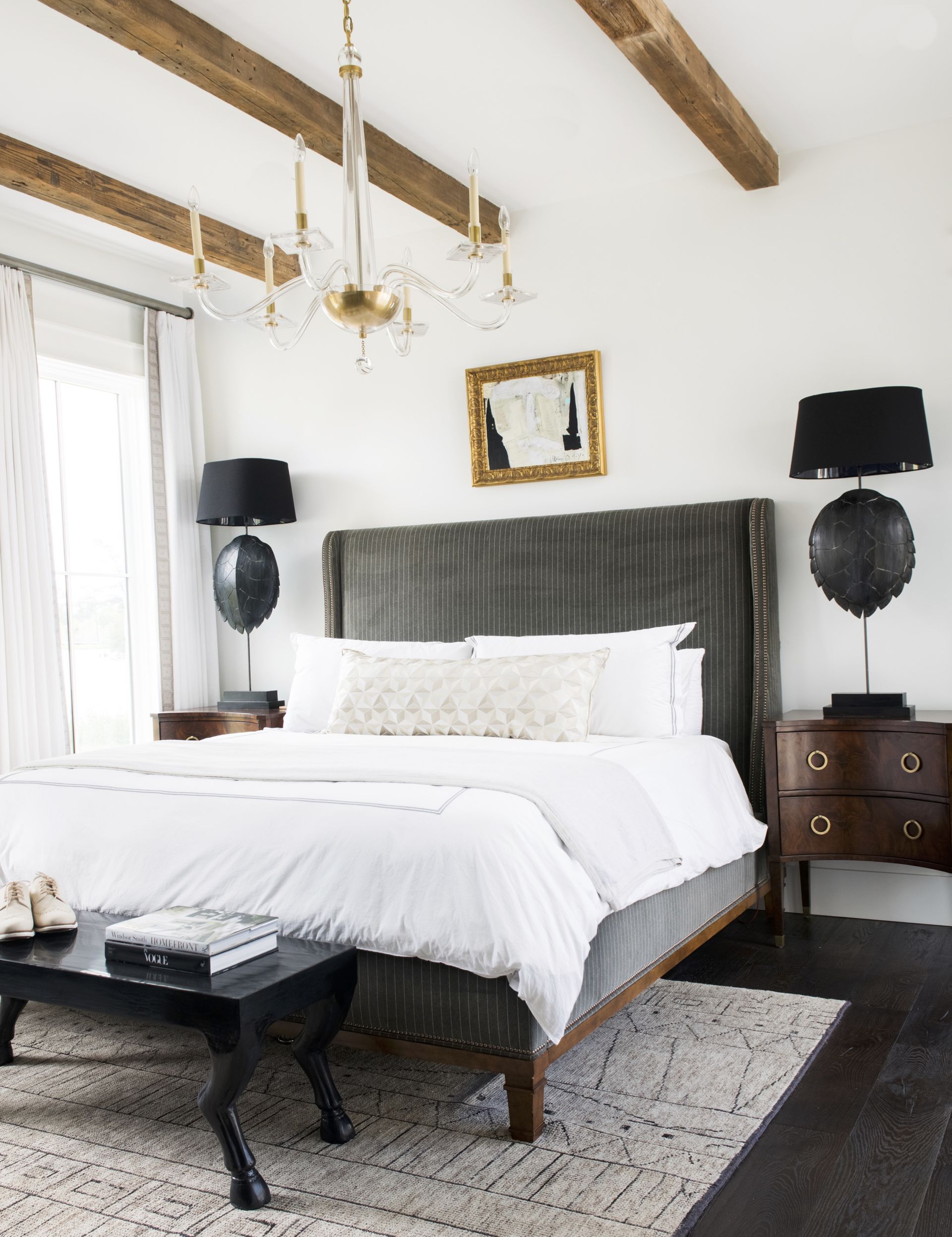 A brown bedroom with a painted table
