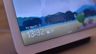 Google Nest Hub home screen showing the time, date and weather