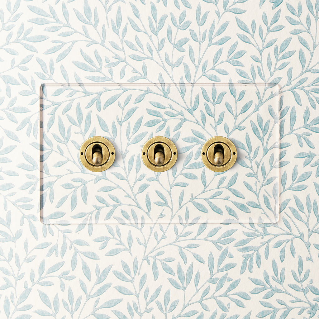 Lucian Perspex Three Gang 2-Way Toggle Switch in Clear Perspex and Aged Brass