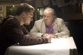 Leonardo DiCaprio talks things over with Jack Nicholson