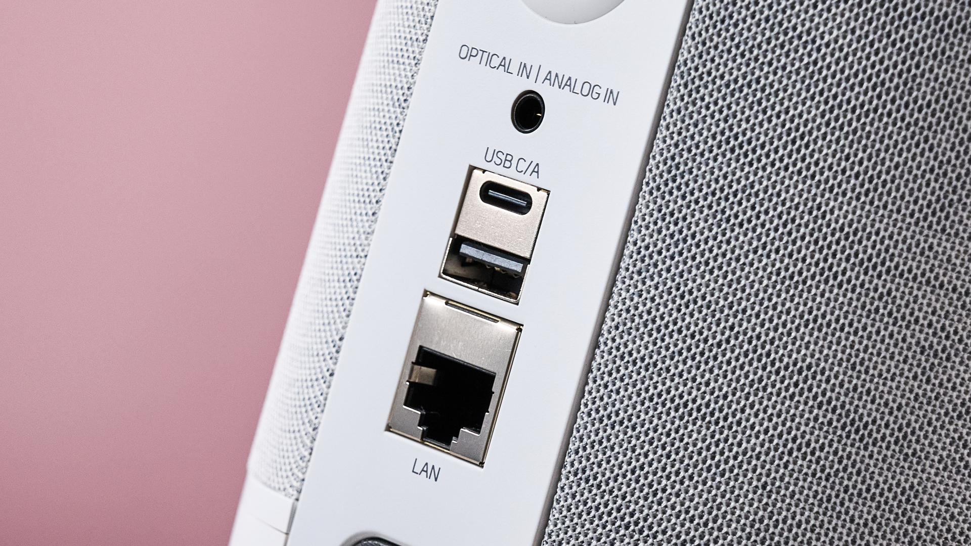 A closeup of the Bluesound Pulse Flex's ports, showing its Ethernet, USB-A port, USB-C port and optical / analog in.