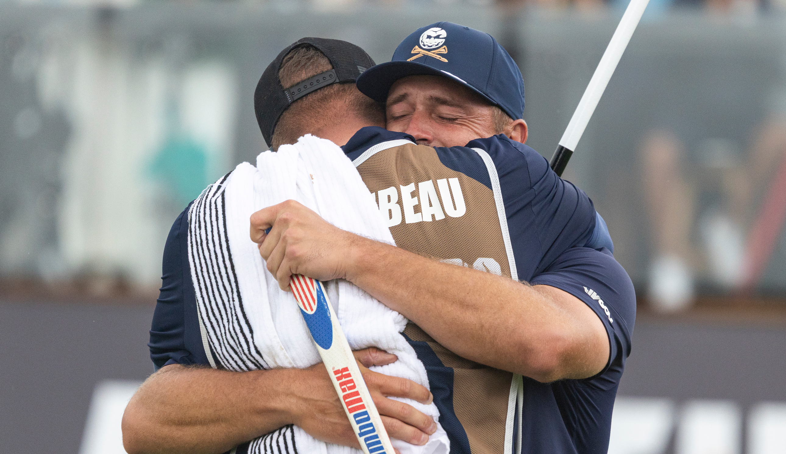 Bryson DeChambeau of Crushers GC celebrates with caddie, Greg Bodine, on the 18th green after the final round of LIV Golf South Africa at The Club at Steyn City on Sunday, March 22, 2026 in Midrand, South Africa.