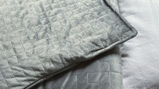 Close up of grey weighted blanket