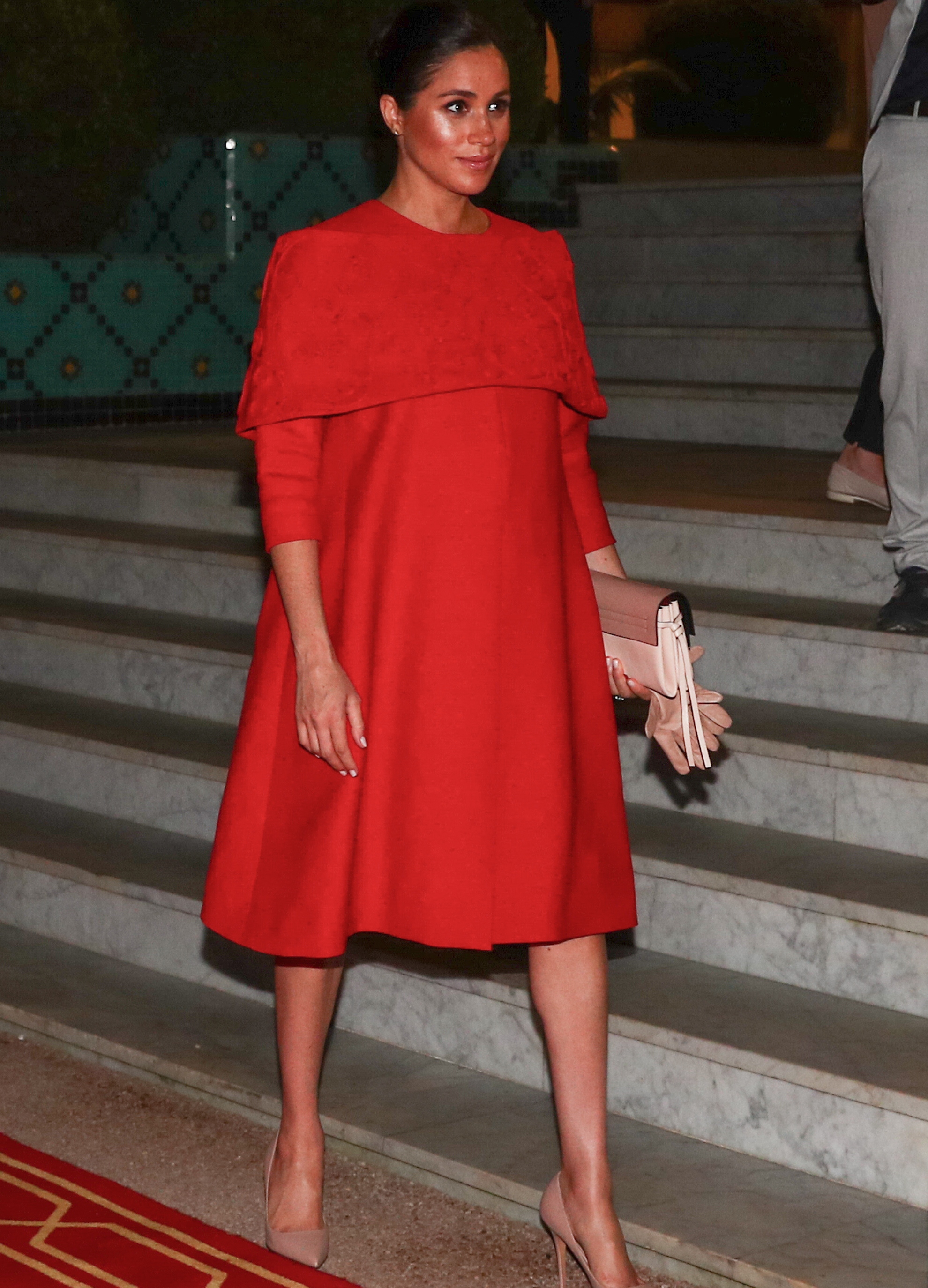 Meghan Markle wearing red dress