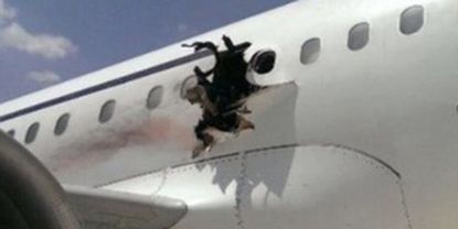 The hole in the side of the Daallo Airlines plane.