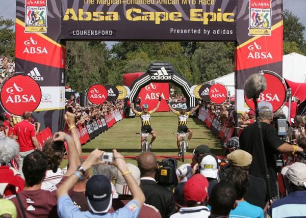Karl Platt and Stefan Sahm of team Bulls 1 cross the finishing line to complete the overall win of The 2010 Absa Cape Epic during the final stage (stage eight) of the 2010 Absa Cape Epic Mountain Bike stage race held in and around Oak Valley in the Western Cape, South Africa.