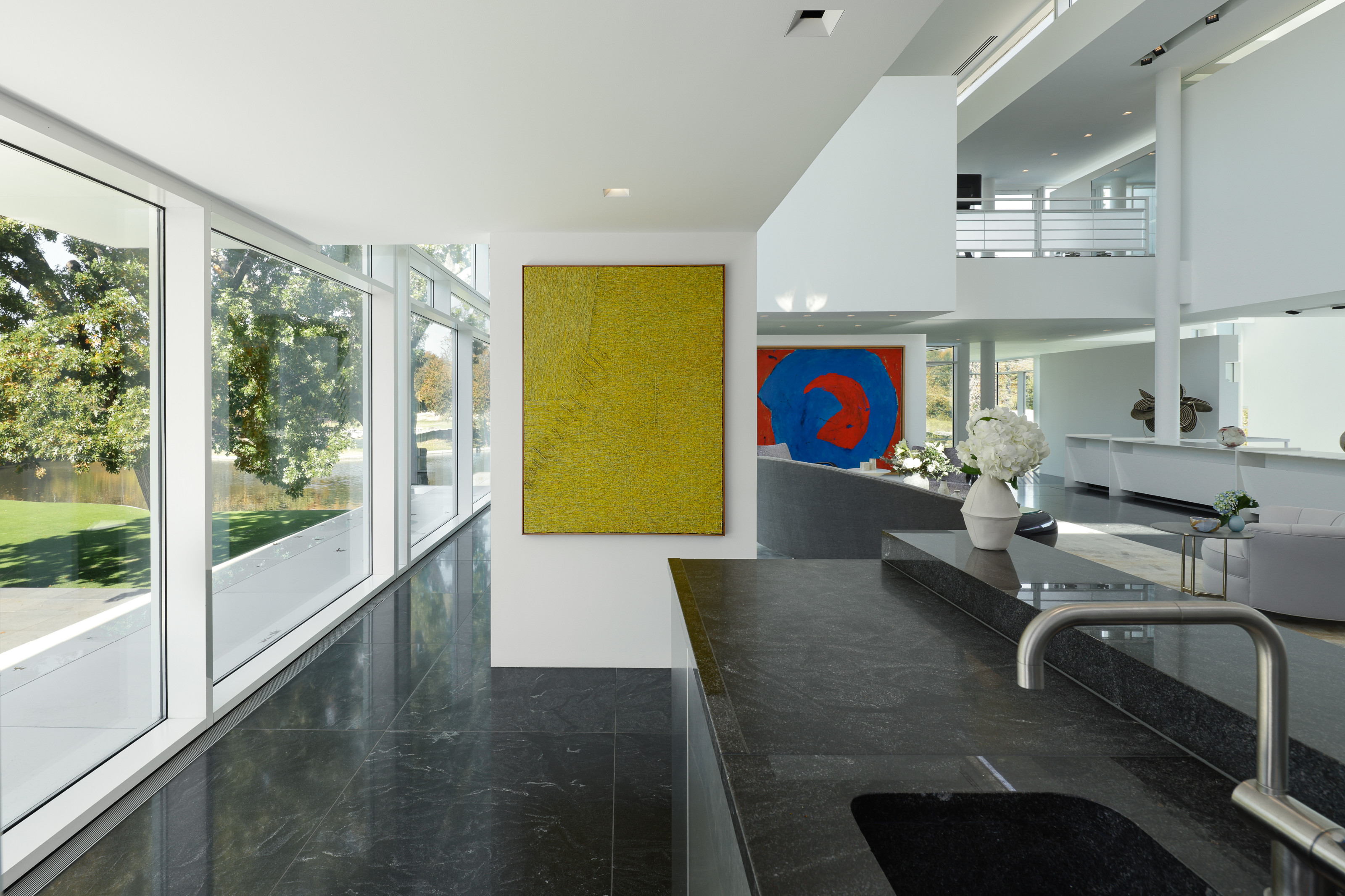 The formal living spaces overlook the grounds