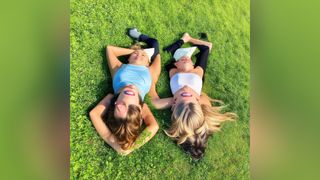 Women lying in grass created using Stable Diffusion 3
