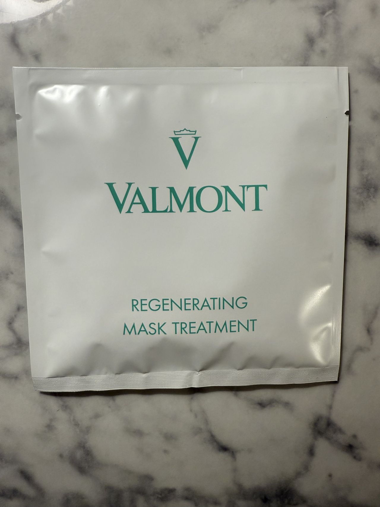 face mask on marble surface