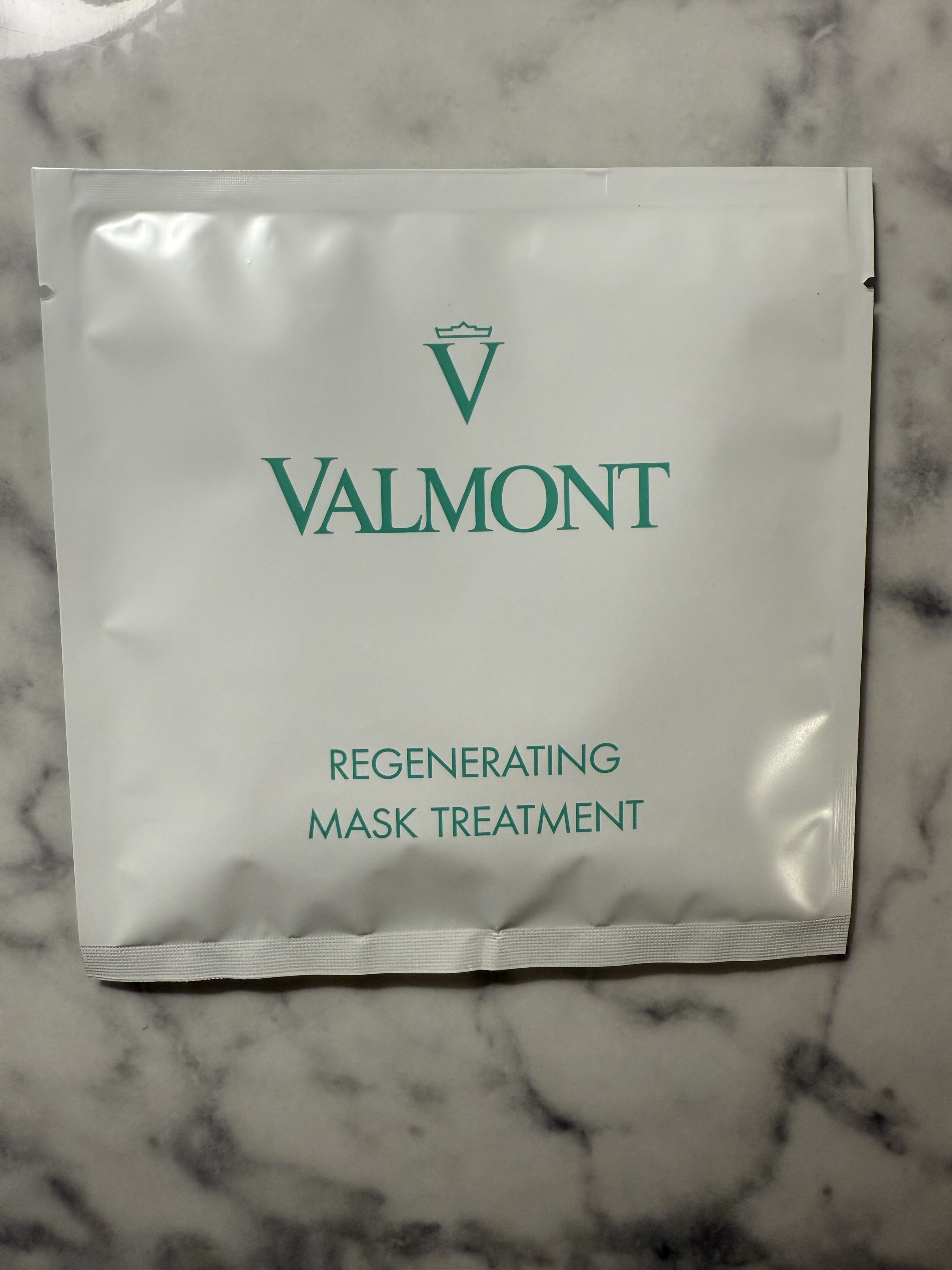 face mask on marble surface