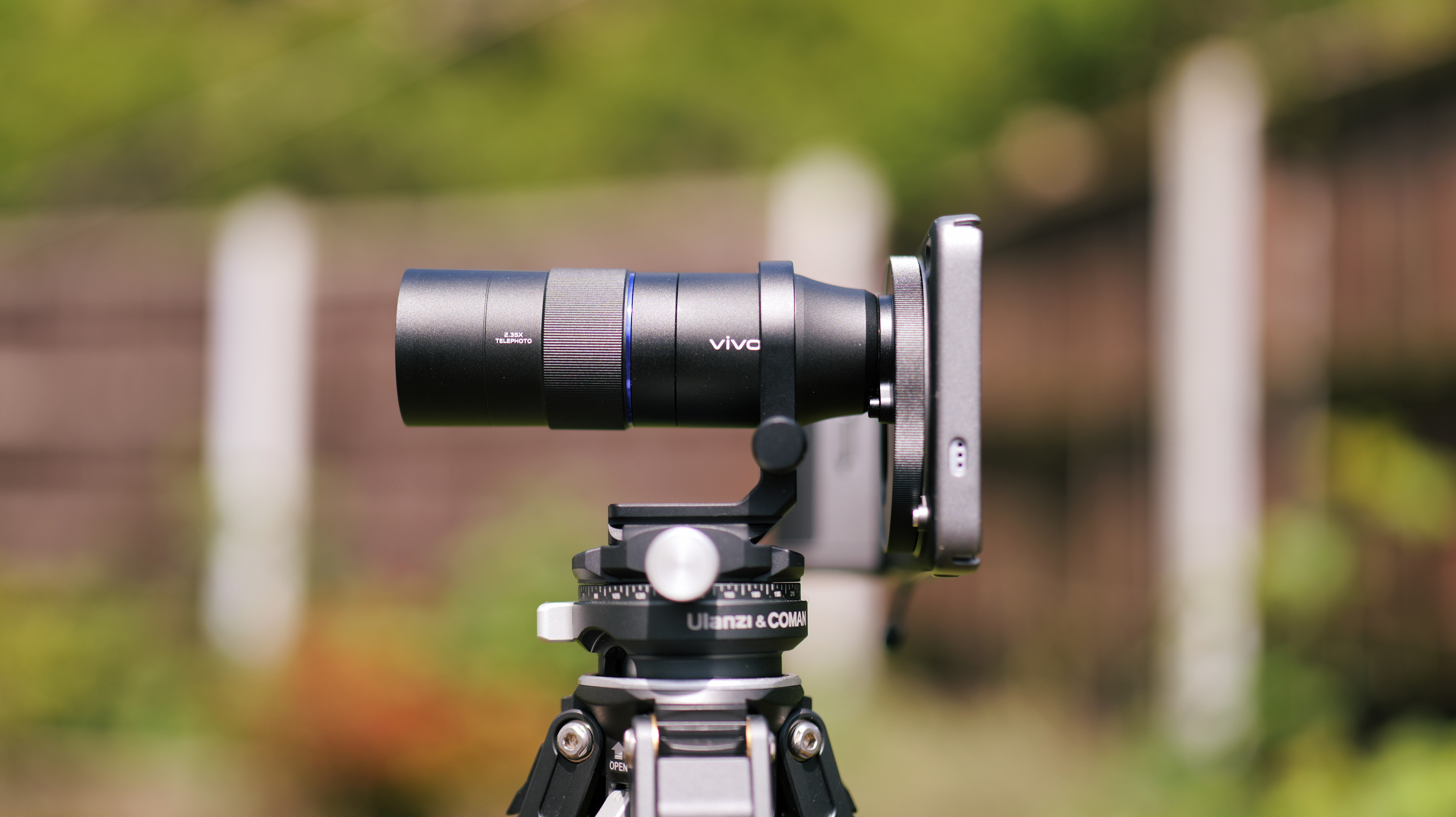 Vivo X200 Ultra phone with teleconverter attached