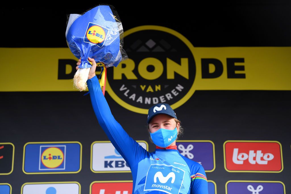 OUDENAARDE BELGIUM APRIL 04 Podium Emma Norsgaard Jorgensen of Denmark and Movistar Team Women Blue best young UCI jersey Celebration during the 18th Ronde van Vlaanderen Tour of Flanders 2021 Womens Elite a 1524km race frim Oudenaarde to Oudenaarde Mask Flowers RVV21 rondevanvlaanderen tourofflanders UCIWWT on April 04 2021 in Oudenaarde Belgium Photo by Tim de WaeleGetty Images