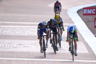 Mat Hayman throws his bike to win the sprint