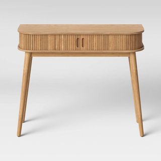 A light wooden slim console table as one of the best Target furniture pieces.