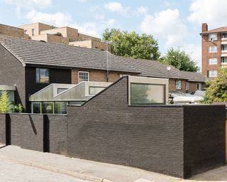 Terraced house with rear garage conversion and extension linked to house