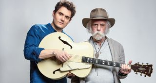 John Mayer and Bob Weir [left] of Dead and Company both play a D'Angelico archtop. Mayer picks the strings, Weird frets a chord.
