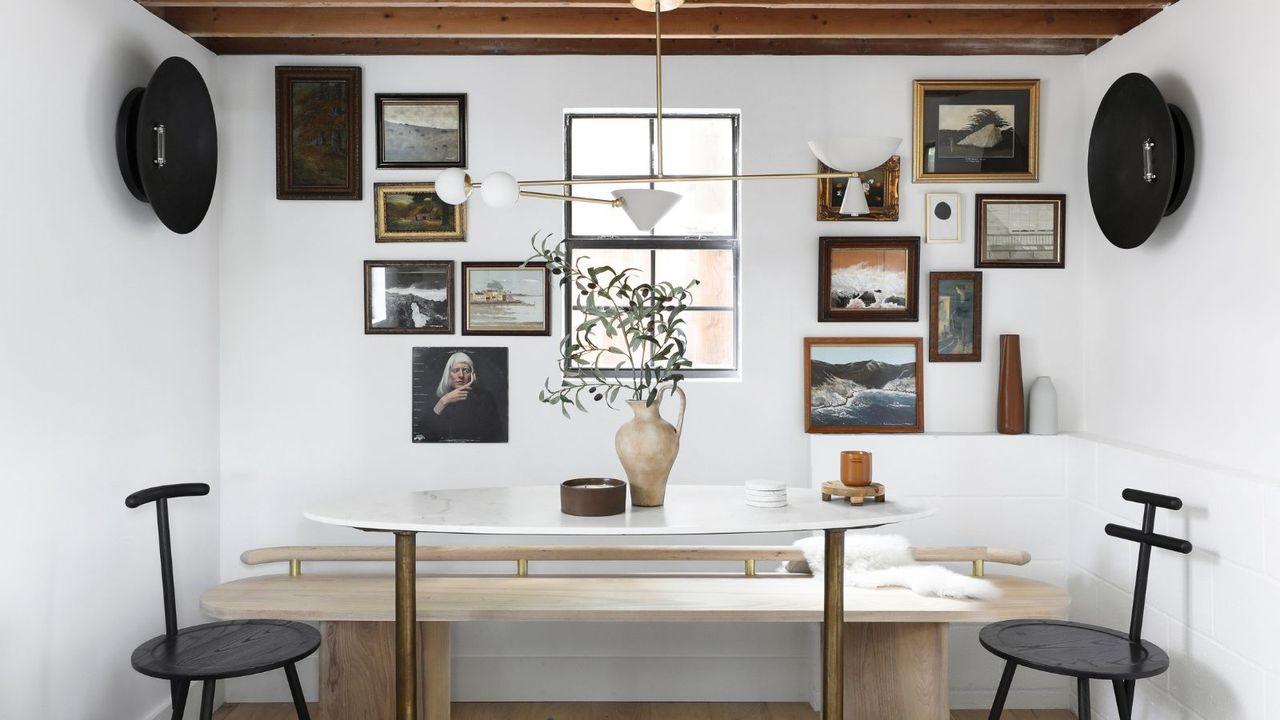 Rustic style dining nook with gallery wall