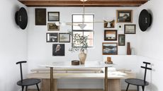 Rustic style dining nook with gallery wall