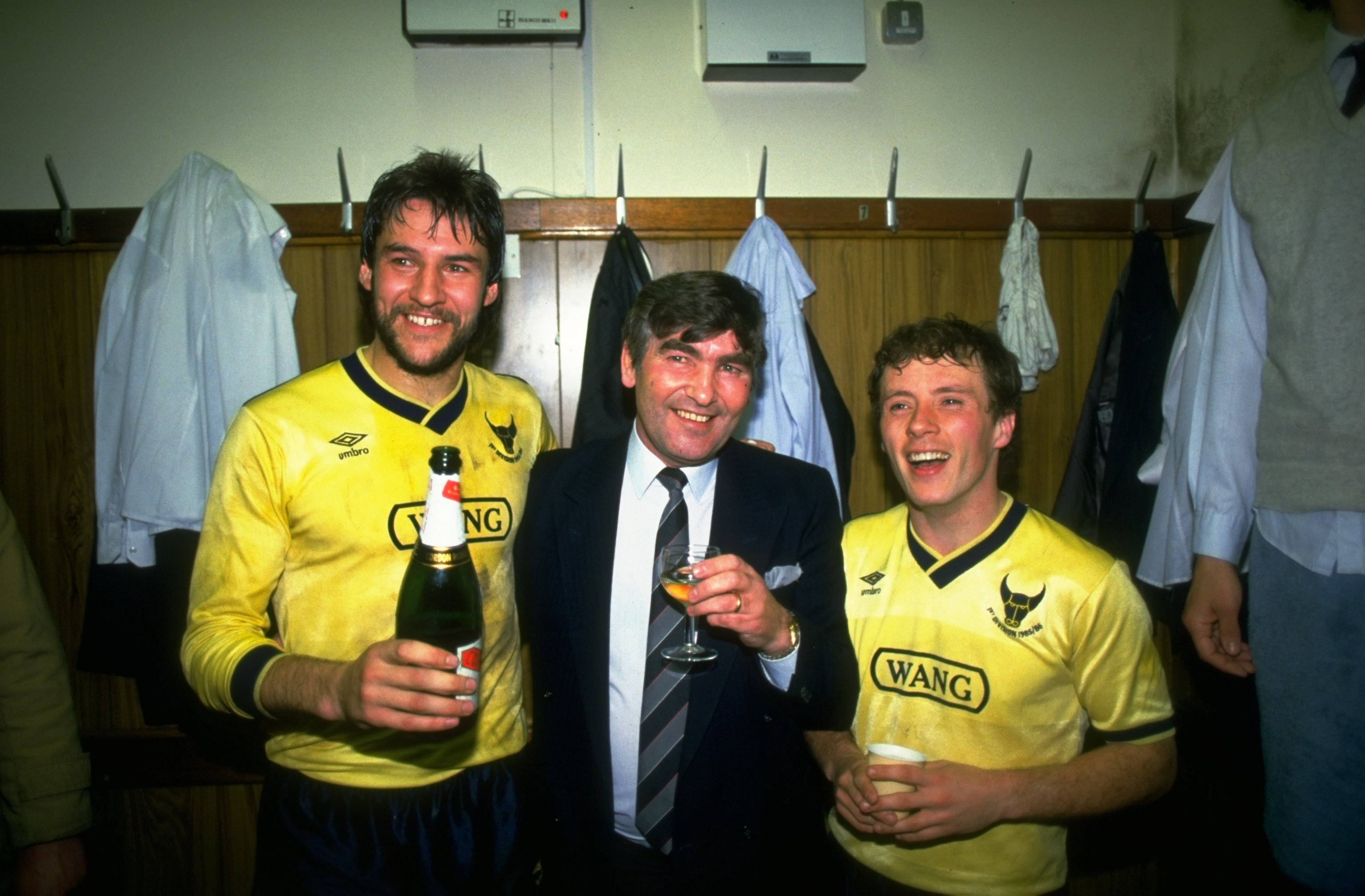 Oxford United manager Mauric Evans (centre) celebrates with Jeremy Charles and Les Phillips after victory over Aston Villa in the League Cup semi-finals in 1986.