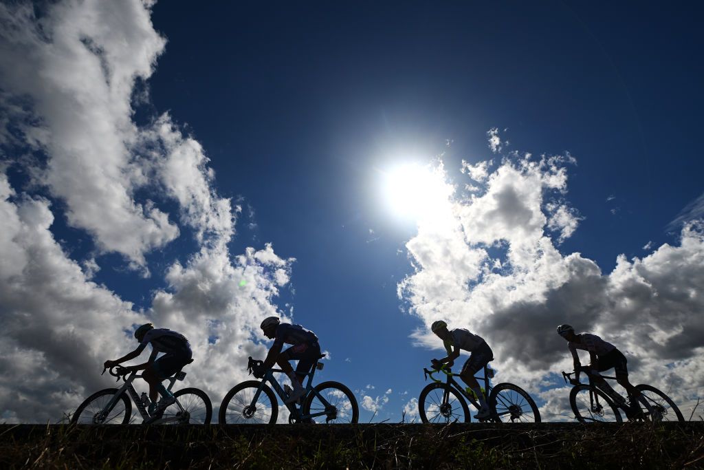 ALTO DE MONCALVILLO SPAIN SEPTEMBER 06 Silhouette of Isaac del Toro of Mexico and UAE Team Emirates Edward Planckaert of Belgium and Team Alpecin Deceuninck Fran Miholjevic of Croatia and Team Bahrain Victorious and Simone Petilli of Italy and Team IntermarcheWanty competing in the breakaway during the La Vuelta 79th Tour of Spain 2024 Stage 19 a 1735km stage from Logrono to Alto de Moncalvillo 1490m UCIWT on September 06 2024 in Alto de Moncalvillo Spain Photo by Dario BelingheriGetty Images