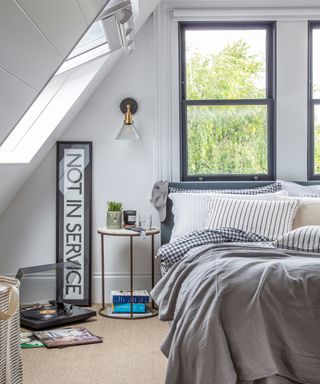 loft conversion bedroom with rooflights and natural flooring