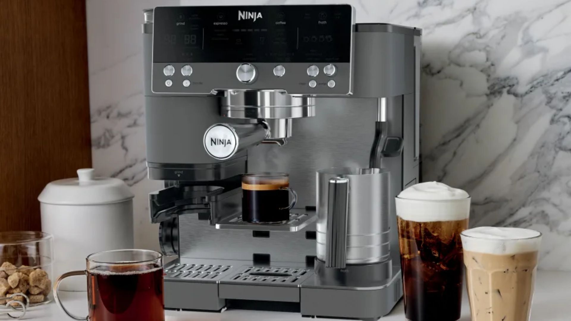 The Ninja Luxe Cafe in Gunmetal Gray with drinks around it