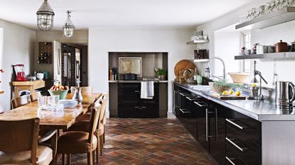 kitchen with open shelving and dining table