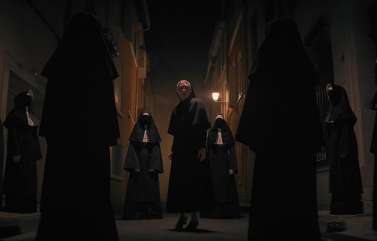 The Nun 2: a group of nuns stand together in a circle